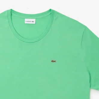 Camiseta de algodón de cuello redondo y corte amplio para hombre