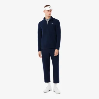 Camiseta de golf de forro polar con cremallera de un cuarto para hombre