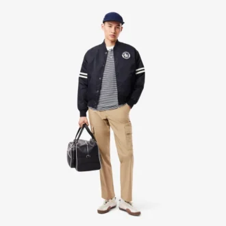 Chaqueta bomber repelente al agua con insignia bordada para hombre