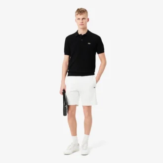 Pantalones cortos de forro polar con rayas y logotipo, corte regular