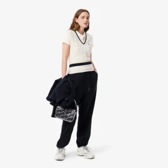 Polo de algodón acanalado L.12.D de corte ajustado para mujer