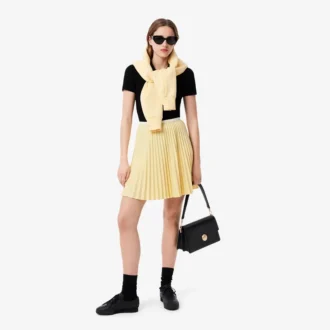 Polo de algodón acanalado L.12.D de corte ajustado para mujer