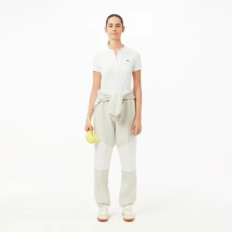 Polo de algodón elástico L.12.D de corte ajustado para mujer