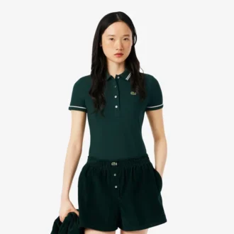 Polo de mujer L.12.D de corte ajustado con detalles de ribete
