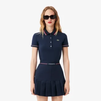 Polo de mujer L.12.D de corte ajustado con detalles de ribete