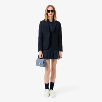 Polo de mujer L.12.D de corte ajustado con detalles de ribete