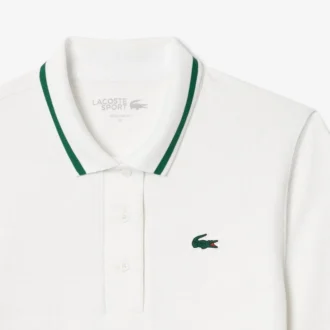 Polo de tenis con cuello a rayas y protección UV para mujer