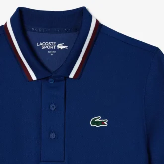 Polo de tenis con cuello a rayas y protección UV para mujer