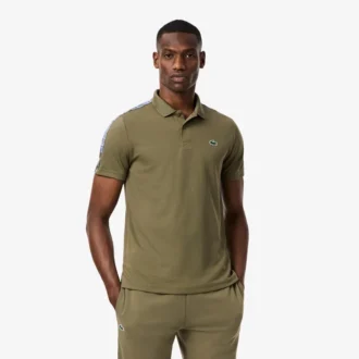 Polo de tenis Ultra Dry con rayas de la marca para hombre