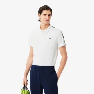 Polo de tenis Ultra Dry con rayas de la marca para hombre