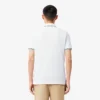 Polo L.12.12 para hombre de corte regular con detalles decorativos