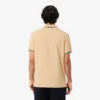 Polo L.12.12 para hombre de corte regular con detalles decorativos