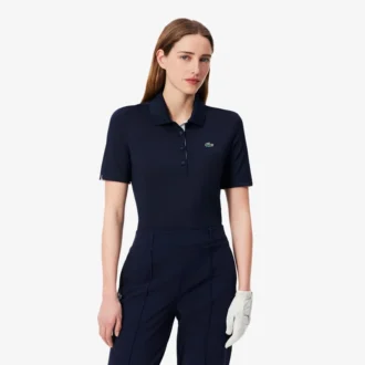 Polos de golf elásticos con protección UV y corte ajustado para mujer