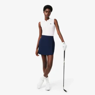 Polos de golf elásticos con protección UV y corte ajustado para mujer