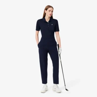 Polos de golf elásticos con protección UV y corte ajustado para mujer