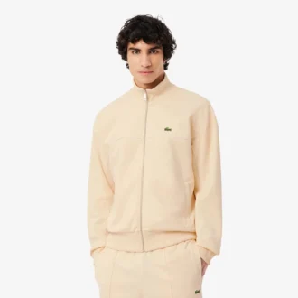 Sudadera con cremallera y detalles decorativos