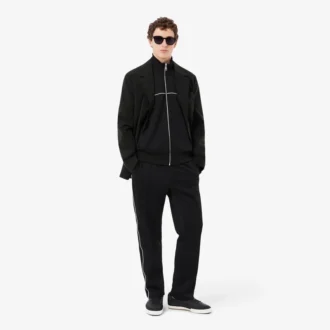 Sudadera con cremallera y detalles decorativos
