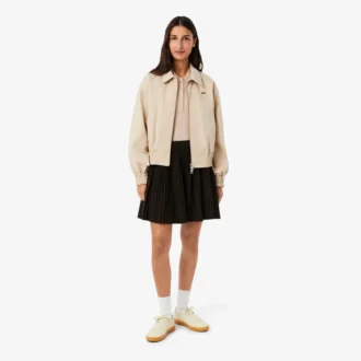 Suéter de lana merino con cuello polo y punto elástico 3D