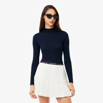 Suéter de mujer de lana merino de punto acanalado con cuello alto