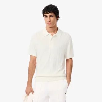 Suéter de punto acanalado fluido con cuello polo para hombre