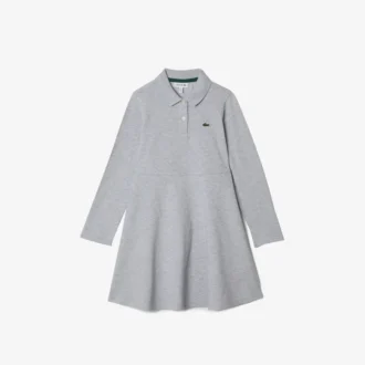 Vestido polo de manga larga elástico de piqué para niña