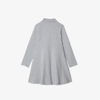 Vestido polo de manga larga elástico de piqué para niña